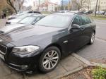 BMW 520D pojemność silnika 1995,00 cm³ rok produkcji 2011,lewy bok czarnego samochodu