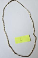 2 - zdjęcie przedstawia łańcuszek złoty, próba złota 0,585, masa 7g;