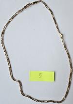 5 - zdjęcie przedstawia łańcuszek złoty, próba złota 0,585, masa 20,50g;