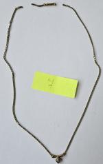 7 - zdjęcie przedstawia łańcuszek złoty, próba złota 0,585, masa 5,21g;