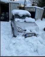 Samochód osobowy Suzuki Ingis  koloru srebrny metalik. 