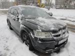 Samochód Dodge Journey koloru czarnego typ SUV.
