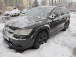 Samochód Dodge Journey koloru czarnego typ SUV.