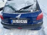 Samochód osobowy Peugeot 206 koloru granatowego. Pięciodrzwiowy. 