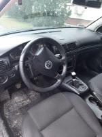 Samochód osobowy VW Passat, szary metalik, sedan. 