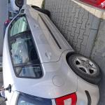 Samochód osobowy VW Polo, koloru srebrny metalik. Pięciodrzwiowy.