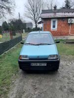 Samochód osobowy  Fiat Cinquecento koloru zielonego.