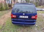 Samochód osobowy wielozadaniowy VOLKSWAGEN SHARAN, 2004, , poj. 1896 cm/3, rodzaj paliwa Olej napędowy, koloru granatowego, pięciodrzwiowy z tyłu pojazdu zamontowany hak holowniczy.

