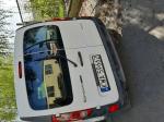 Samochód ciężarowy renault Kangoo koloru białego. Samochód unieruchomiony. 