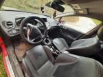 Samochód osobowy marki Ford Fiesta, rok produkcji 2013, benzyna. Wnętrze pojazdu