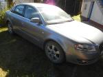 Samochód osobowy Audi A4 w kolorze srebrnym bok pojazdu