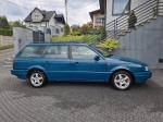 Samochód osobowy Volkswagen Passat w kolorze seledynowym prawy bok