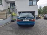 Samochód osobowy Volkswagen Passat w kolorze seledynowym tył