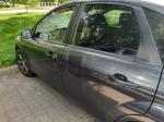 Samochód osobowy Ford Focus srebrny lewy bok
