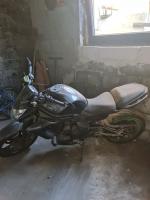  Motocykl Kawasaki, ER 650, osobowy w kolorze czarnym, rok produkcji 2014.