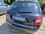 Samochód osobowy Audi A4 kombi, kolor granatowy metalizowany.  